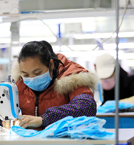 Our worker make a tie by handmade
